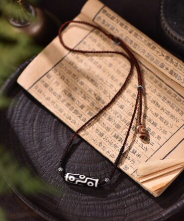 Nine-Eyed Dzi & Onyx Tibetan Necklace - Earthy Brown + Soothing Black | Gem of Hidden Fortune