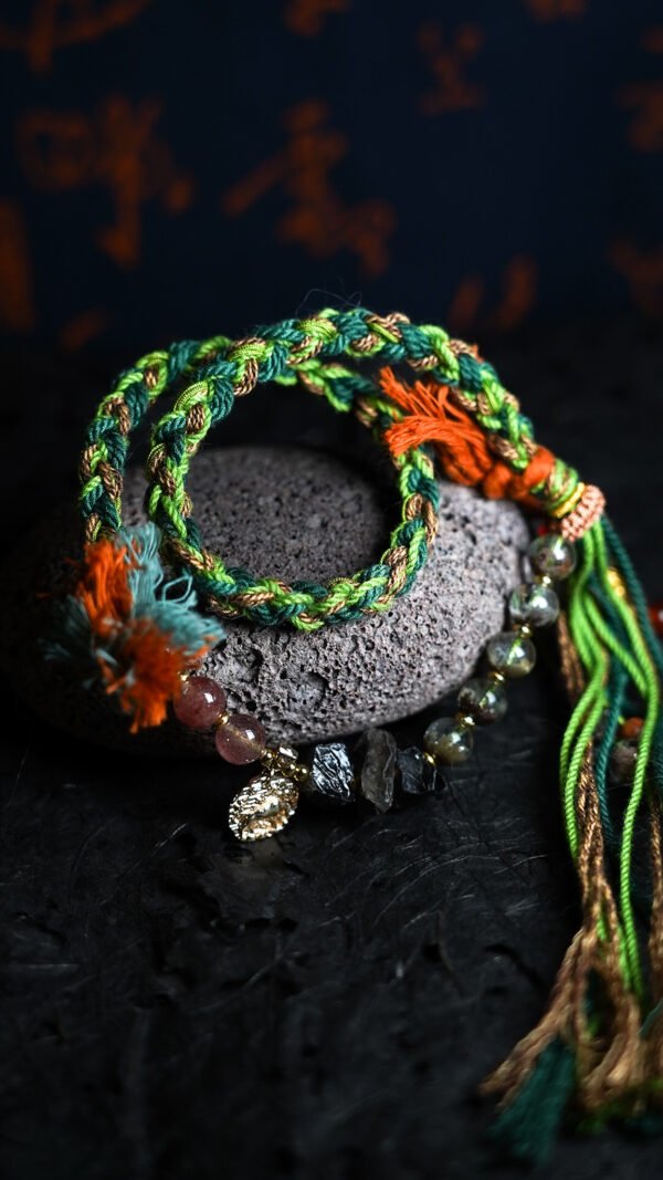 Taurus Earth-Weaved Calm Bracelet — Green & Soft Brown × Woven Stability Colors speak to the grounded heart of Taurus: this bracelet weaves invisible emotions of growth, abundance, and steady calm into tangible color—with lush green and warm soft brown as the foundation. Inspired by Earth’s quiet strength, every strand of natural silk and each crystal is chosen to mirror Taurus’ need for security, progress, and emotional rootedness. It’s not just jewelry; it’s a wearable reminder of your ability to grow slowly, thrive steadily, and hold space for calm. ✨ Emotional Weaving (Color × Feeling)This bracelet uses earthy hues to amplify: Green: The energy of growth — nurtures ambition, attracts abundance, and fosters patience as things unfold naturally. Soft Brown: The anchor of stability — grounds scattered thoughts, builds emotional security, and reminds you of your unshakable foundation. Together, green and soft brown create an emotional synergy: growth without rush, abundance with gratitude, and calm that lasts through change. 🪨 Crystal Color & EnergyEach crystal echoes the bracelet’s earthy color story and enhances Taurus-aligned emotions:• Green Phantom Quartz (Primary Stone) — Lush green tones mirror the cord’s growth energy; attracts wealth, supports personal development, and turns dreams into tangible progress.• Additional Green Phantom Quartz — Deepens the green color palette; amplifies abundance energy and strengthens connection to Earth’s grounding force.• Rose Quartz — Soft pink hues complement green & brown; adds gentle warmth, fostering self-compassion amid growth.• Smoky Quartz — Muted brown tones align with the soft brown cord; grounds excess energy, reduces stress, and enhances emotional stability. 🧵 Color-Centric CraftHandwoven with 100% natural silk cord — smooth, earthy, and designed to let nature’s hues shine: Rich, forest-inspired green cord: The star of the design, chosen for its association with growth, prosperity, and Taurus’ love of nature. Warm soft brown thread accents: Adds depth and calm, balancing green’s vitality with a sense of rooted security. Intention-driven knots: Each weave ties color to emotion, so wearing it becomes a daily practice of "activating" steady growth and calm. 🌿 Wear Your EmotionThis bracelet is a color-coded emotional tool for Taurus’ grounded spirit: Wear it when you need patience (e.g., long-term projects, personal growth journeys). Let green and brown remind you to trust the process—growth takes time, and stability is your superpower. Pair it with earthy tones or neutrals to amplify its natural, calm energy. 🎁 Gift Meaning"May this green nurture your growth, and this brown steady your path — thrive in calm, grow in abundance."Perfect for Taurus, nature lovers, anyone seeking stability, or those wanting to align with Earth’s quiet strength.