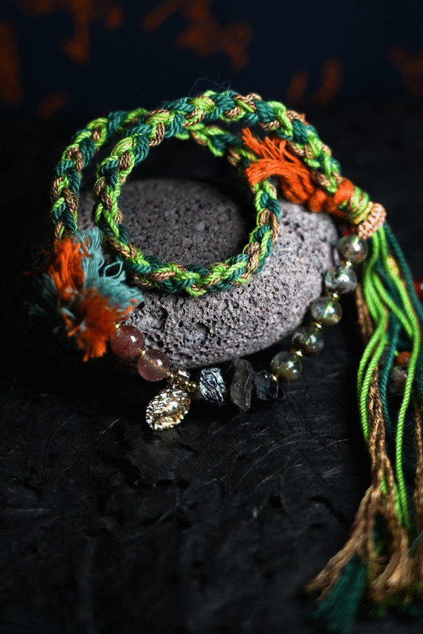 Taurus Earth-Weaved Calm Bracelet — Green & Soft Brown × Woven Stability Colors speak to the grounded heart of Taurus: this bracelet weaves invisible emotions of growth, abundance, and steady calm into tangible color—with lush green and warm soft brown as the foundation. Inspired by Earth’s quiet strength, every strand of natural silk and each crystal is chosen to mirror Taurus’ need for security, progress, and emotional rootedness. It’s not just jewelry; it’s a wearable reminder of your ability to grow slowly, thrive steadily, and hold space for calm. ✨ Emotional Weaving (Color × Feeling)This bracelet uses earthy hues to amplify: Green: The energy of growth — nurtures ambition, attracts abundance, and fosters patience as things unfold naturally. Soft Brown: The anchor of stability — grounds scattered thoughts, builds emotional security, and reminds you of your unshakable foundation. Together, green and soft brown create an emotional synergy: growth without rush, abundance with gratitude, and calm that lasts through change. 🪨 Crystal Color & EnergyEach crystal echoes the bracelet’s earthy color story and enhances Taurus-aligned emotions:• Green Phantom Quartz (Primary Stone) — Lush green tones mirror the cord’s growth energy; attracts wealth, supports personal development, and turns dreams into tangible progress.• Additional Green Phantom Quartz — Deepens the green color palette; amplifies abundance energy and strengthens connection to Earth’s grounding force.• Rose Quartz — Soft pink hues complement green & brown; adds gentle warmth, fostering self-compassion amid growth.• Smoky Quartz — Muted brown tones align with the soft brown cord; grounds excess energy, reduces stress, and enhances emotional stability. 🧵 Color-Centric CraftHandwoven with 100% natural silk cord — smooth, earthy, and designed to let nature’s hues shine: Rich, forest-inspired green cord: The star of the design, chosen for its association with growth, prosperity, and Taurus’ love of nature. Warm soft brown thread accents: Adds depth and calm, balancing green’s vitality with a sense of rooted security. Intention-driven knots: Each weave ties color to emotion, so wearing it becomes a daily practice of "activating" steady growth and calm. 🌿 Wear Your EmotionThis bracelet is a color-coded emotional tool for Taurus’ grounded spirit: Wear it when you need patience (e.g., long-term projects, personal growth journeys). Let green and brown remind you to trust the process—growth takes time, and stability is your superpower. Pair it with earthy tones or neutrals to amplify its natural, calm energy. 🎁 Gift Meaning"May this green nurture your growth, and this brown steady your path — thrive in calm, grow in abundance."Perfect for Taurus, nature lovers, anyone seeking stability, or those wanting to align with Earth’s quiet strength.