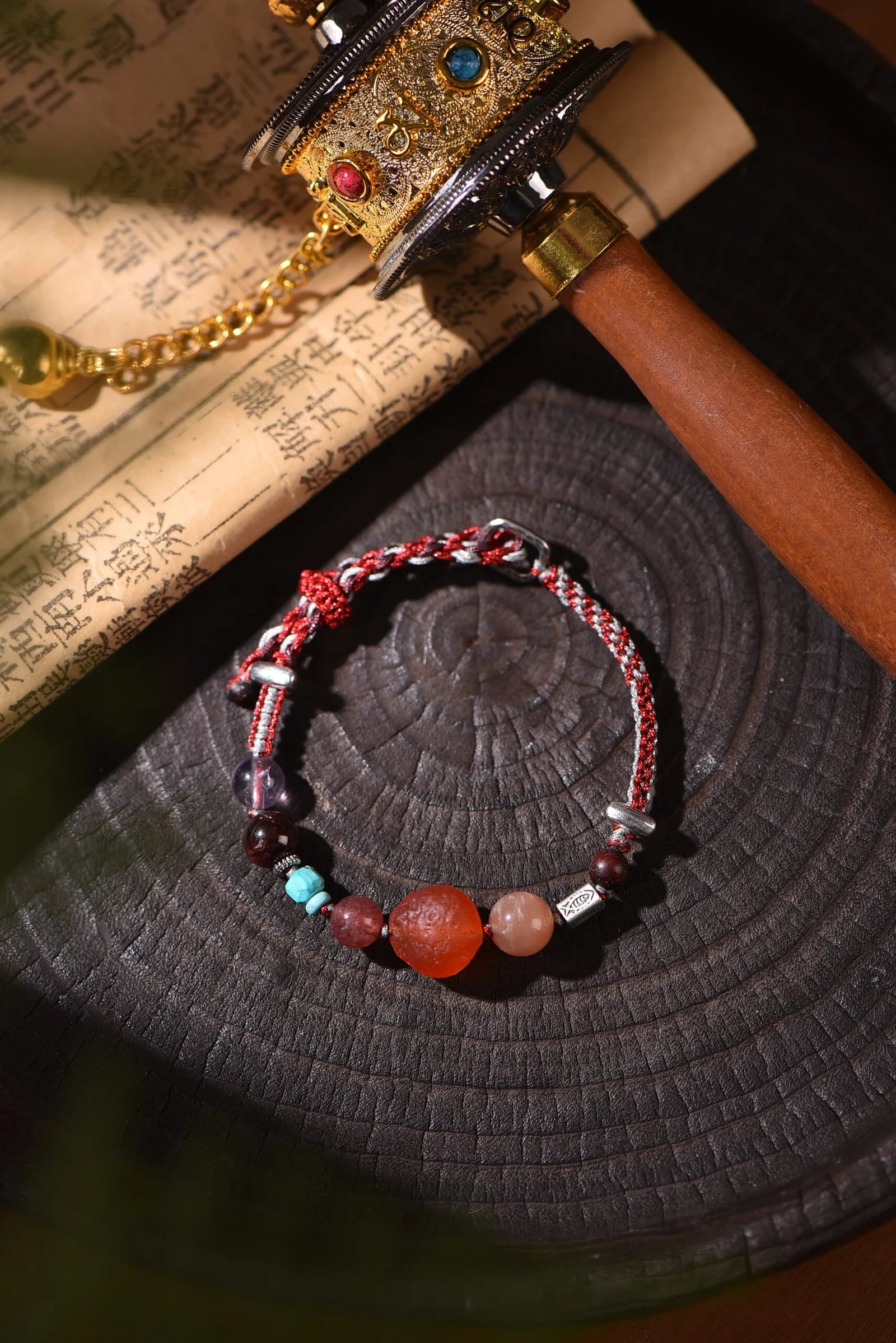 handwoven single-strand bracelet in festival red and cream white — Five Elements by TibetanTwist