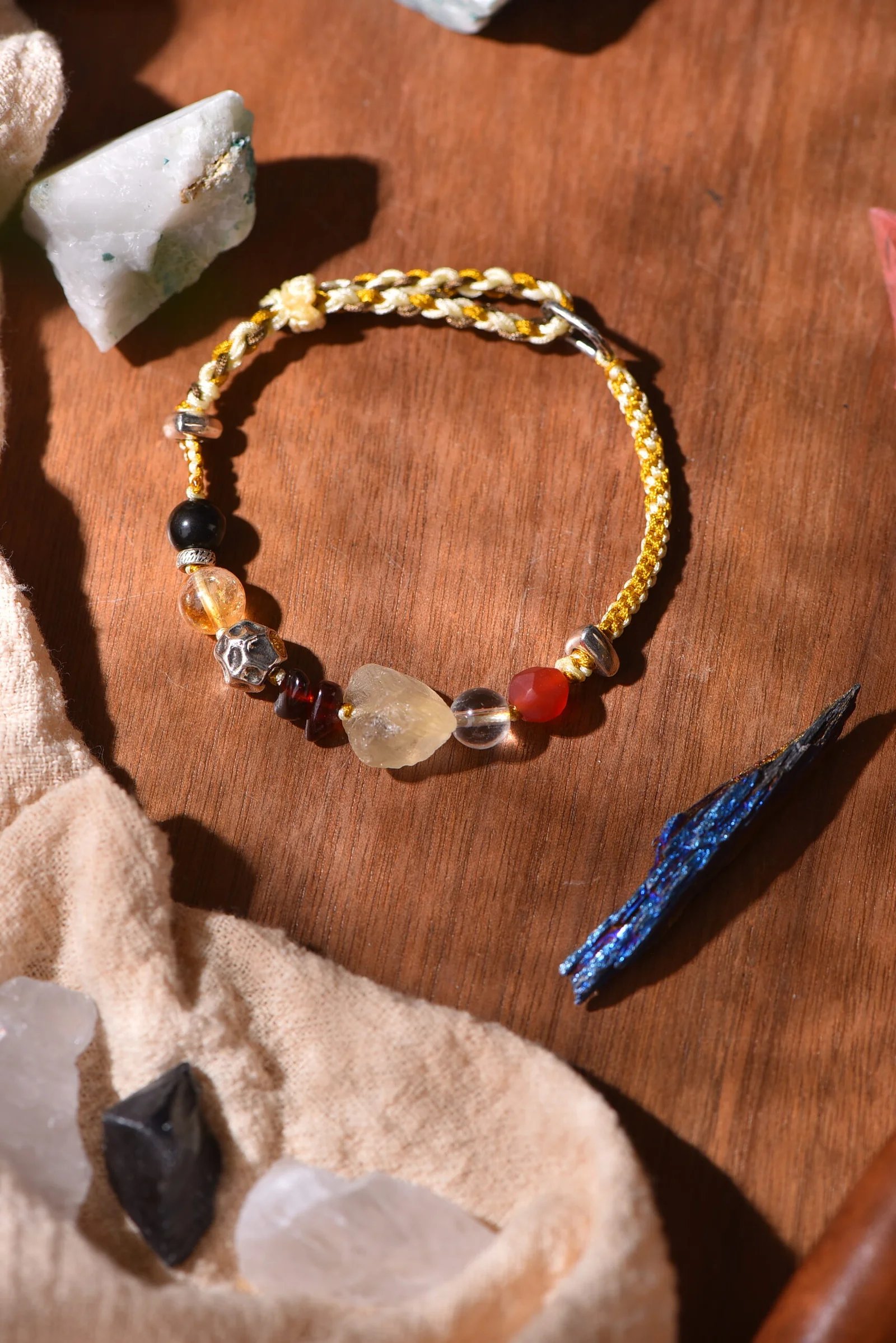 handwoven single-strand bracelet in pale gold, cream and earth brown — Five Elements by TibetanTwist